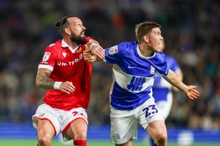 Steven Fletcher of Wrexham and Alfons Sampsted of Birmingham City challenge for the ball during the EFL League One match at St Andrew&#039;s on September 16, 2024