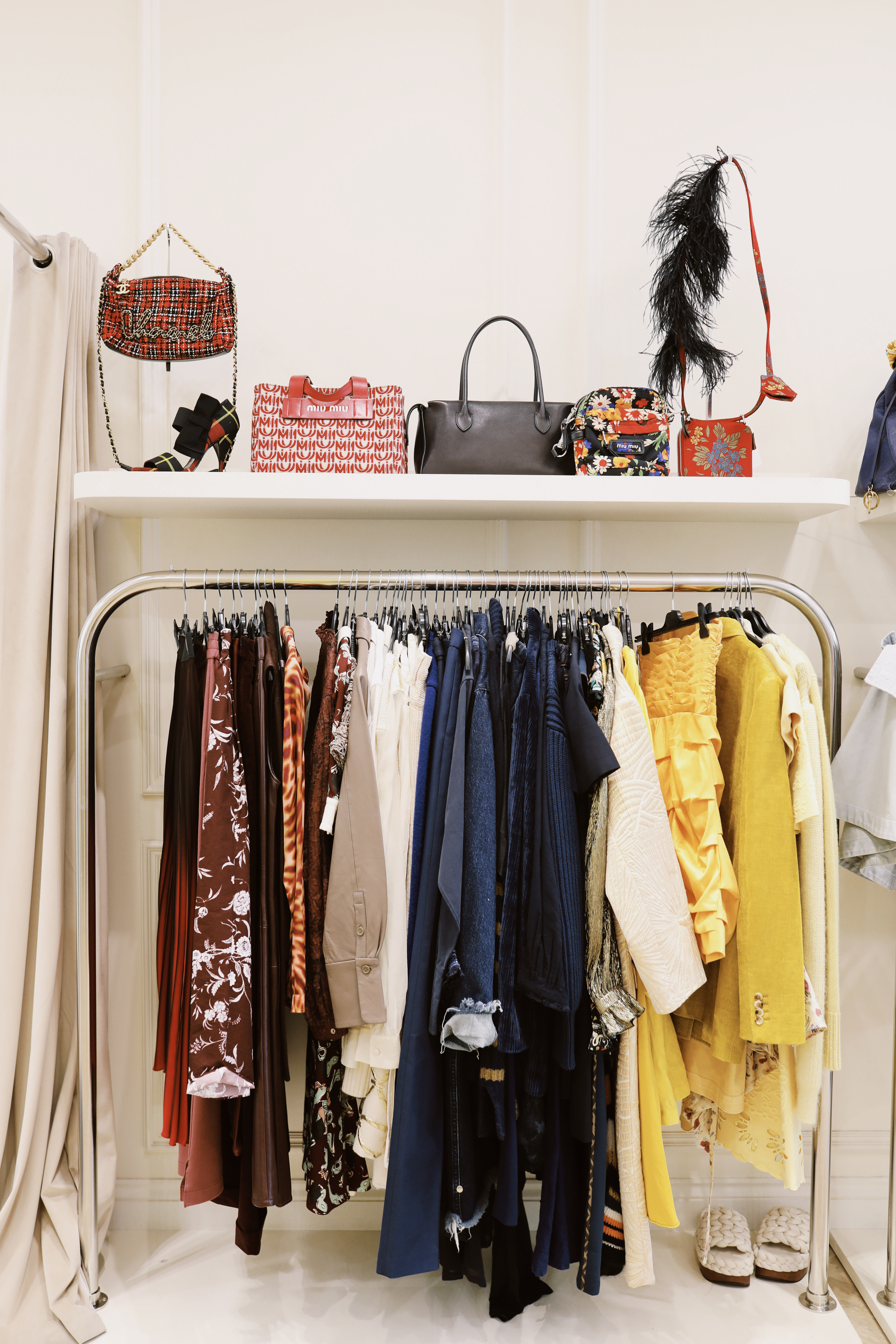clothes and bags inside the sign of the times london store