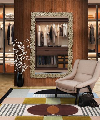 A walk-in closet with an armchair