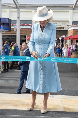 Queen Camilla, as Patron of York Racecourse, attends the Ebor Festival and opens the racecourse latest development, the new, state-of-the-art, complex called the Bustardthorpe Development at York Racecourse on August 24, 2024 in York, England.