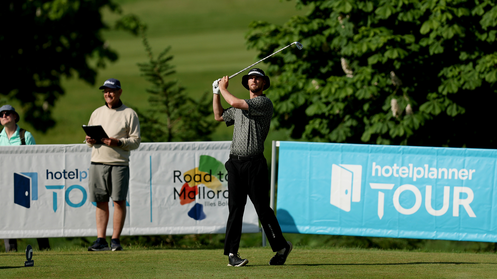 Sam Jones hits a driver off the tee
