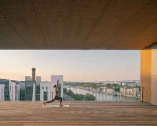 wood up wood architecture timber tower gridded facade, blocky construction in paris landscape