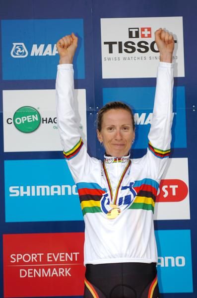 Judth Arndt celebrates her rainbow jersey