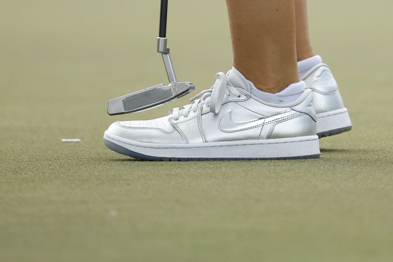 A close up of Nelly Korda's putter