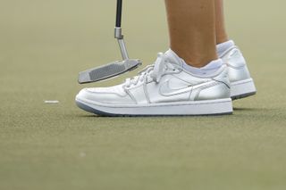 A close up of Nelly Korda's putter