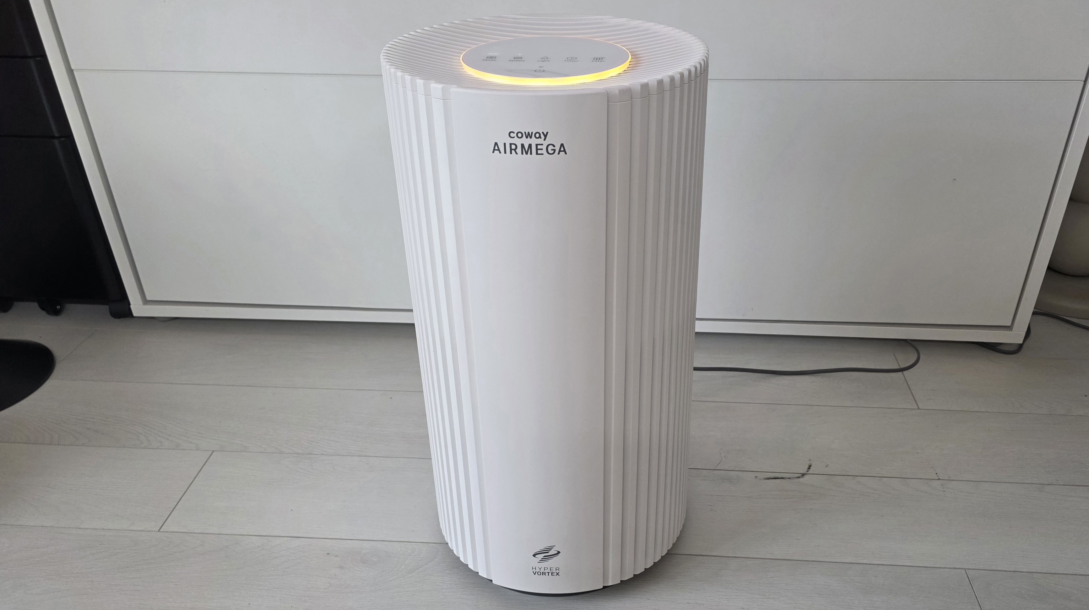 The Coway Airmega 350 from the front, showing off its whole body and multicolor lighting.