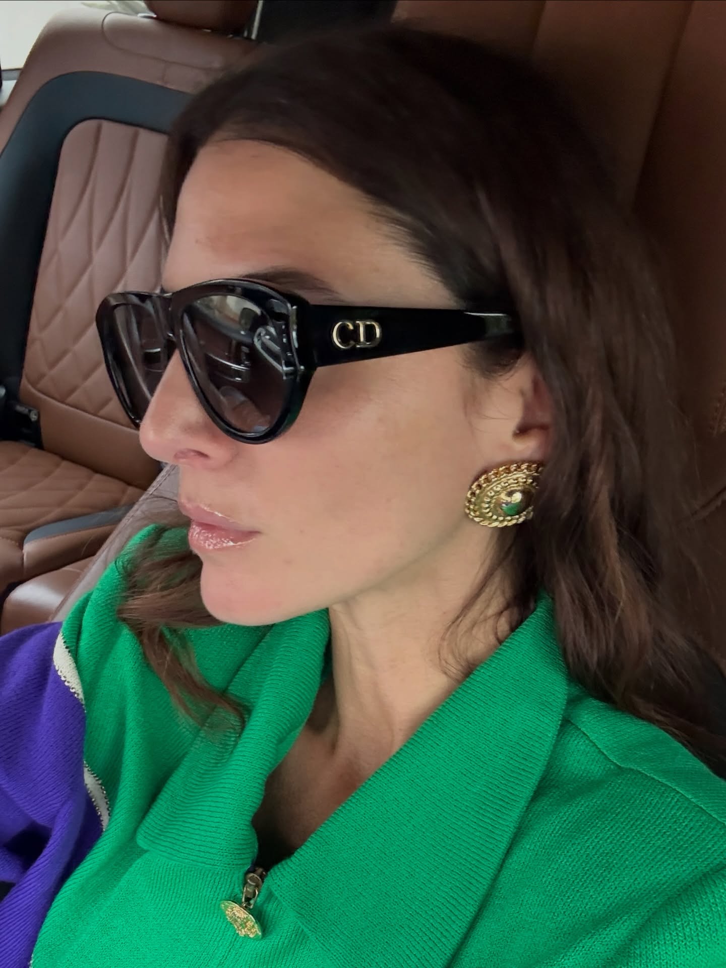 Woman wearing a summer 2026 jewelry trend.