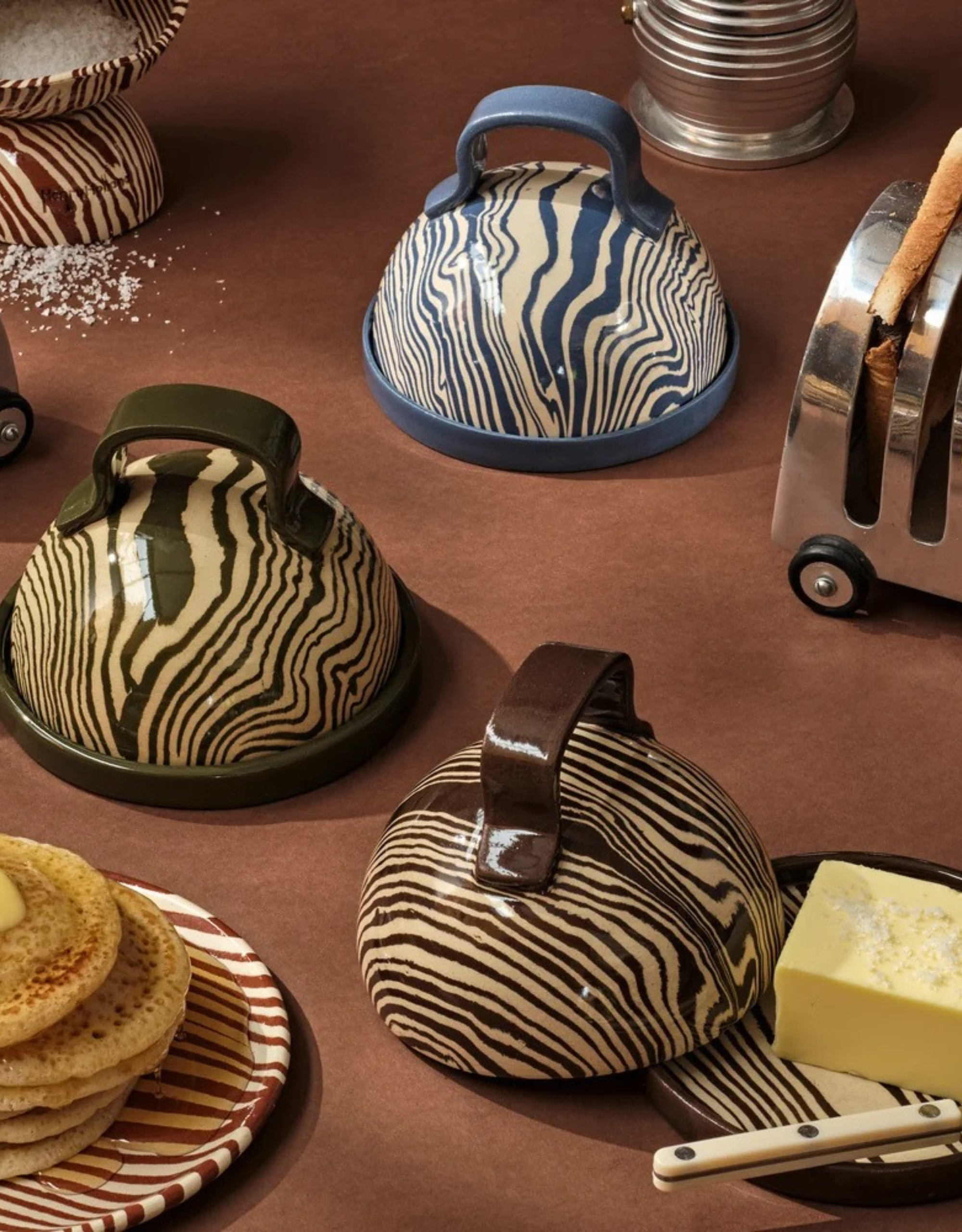 Henry Holland marble ceramic butter dishes in brown, green, and blue