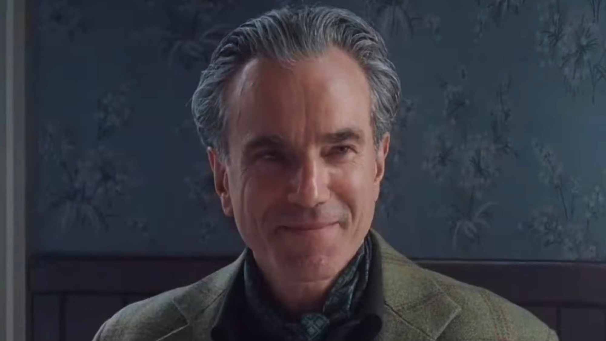 A smiling Daniel Day-Lewis in Phantom Thread