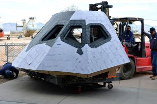 NASA's retired Guidance and Navigation Simulator (GNC) is seen being delivered to the Pima Air & Space Museum in Tucson after being used to film Roland Emmerich's "Moonfall."
