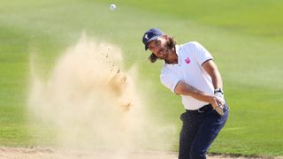 Tommy Fleetwood of Team Great Britain & Ireland plays a bunker shot on the eighth hole during a practice round prior to the Team Cup at Abu Dhabi Golf Resort on January 09, 2025 in Abu Dhabi, United Arab Emirates.