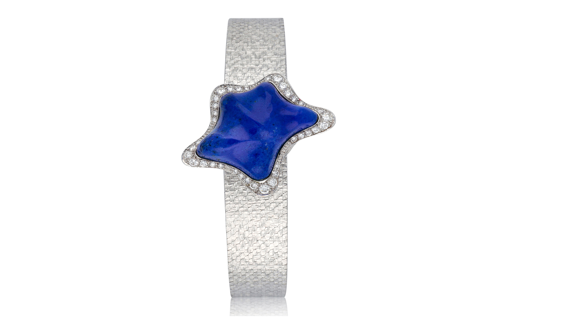 vintage white gold and sapphire Piaget secret starfish watch