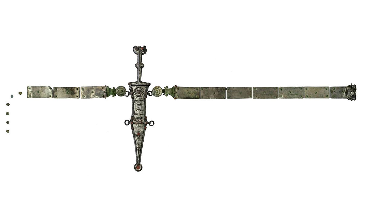 The Roman soldier would have put the dagger in its sheath and hung it from a belt.