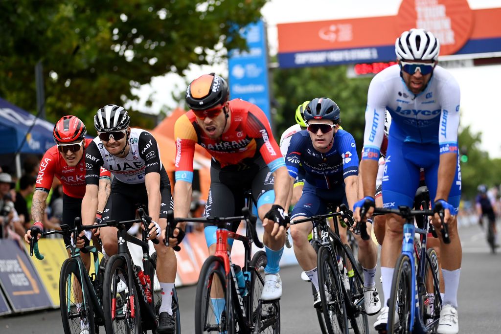 TANUDAZ AUSTRALIA JANUARY 18 LR Hugo Hofstetter of France and Team Arkea Samsic Alessandro Covi of Italy and UAE Team Emirates and Paul Penhoet of France and Team Groupama FDJ cross the finish line during the 23rd Santos Tour Down Under 2023 Stage 1 a 1499km stage from Tanunda to Tanunda on January 18 2023 in Tanunda Australia Photo by Tim de WaeleGetty Images