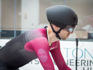 Tom riding in the wind tunnel wearing the POC Procen Air helmet