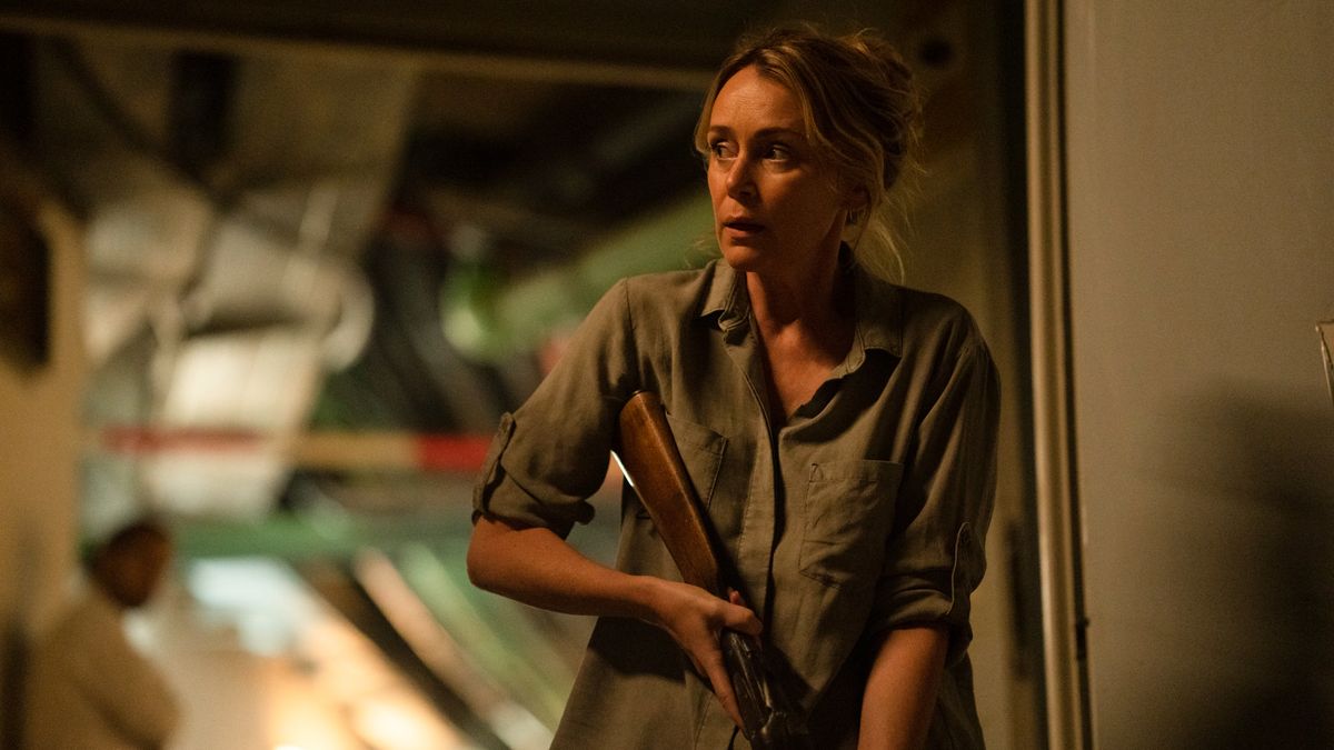 Keeley Hawes wielding a shotgun in Crossfire