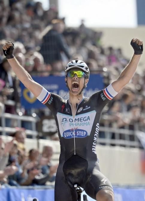 Netherland's Niki Terpstra reacts as he crosses the finish line to win the 112th edition of the Paris-Roubaix