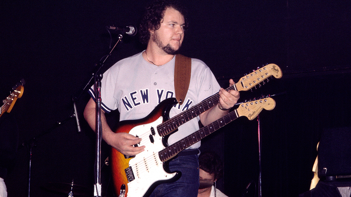 American Pop Rock musician Christopher Cross plays electric guitar as he performs onstage at Greenwich Village's Bottom Line, New York, New York, May 28, 1980. His instrument is a Fender twin-neck, six &amp; twelve string guitar.