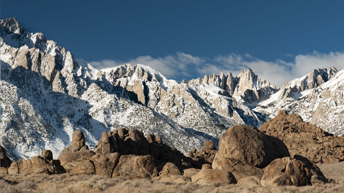 Snow on Mount WHitney with rocks in the foreground