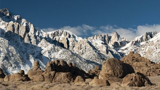 Snow on Mount Whitney with rocks in the foreground