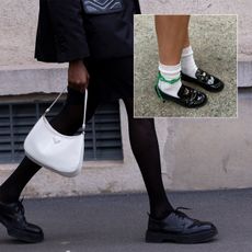 Derby shoes, white prada bag, and black loafers