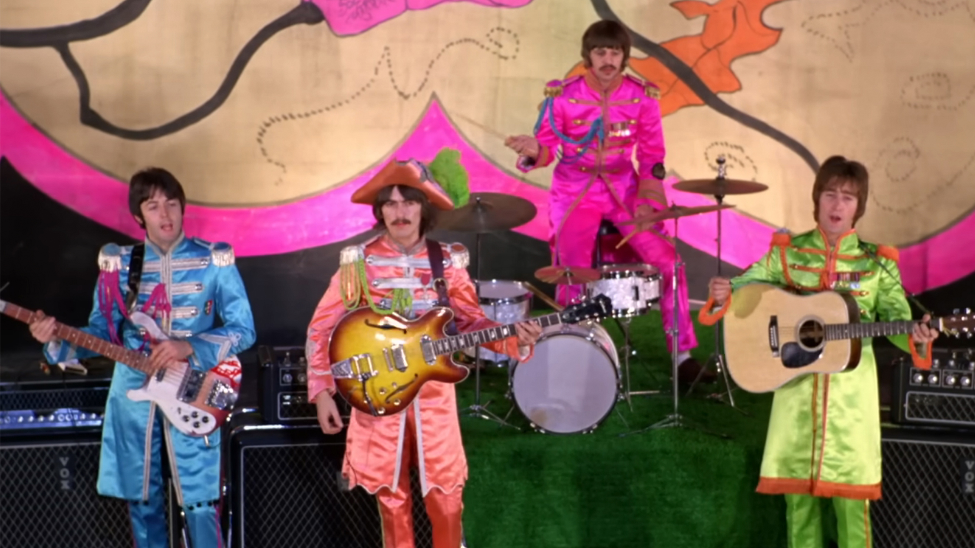 The Beatles performing in the Magical Mystery Tour special, dressed as their characters from Sgt. Peppers