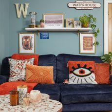 blue living room with blue sofa