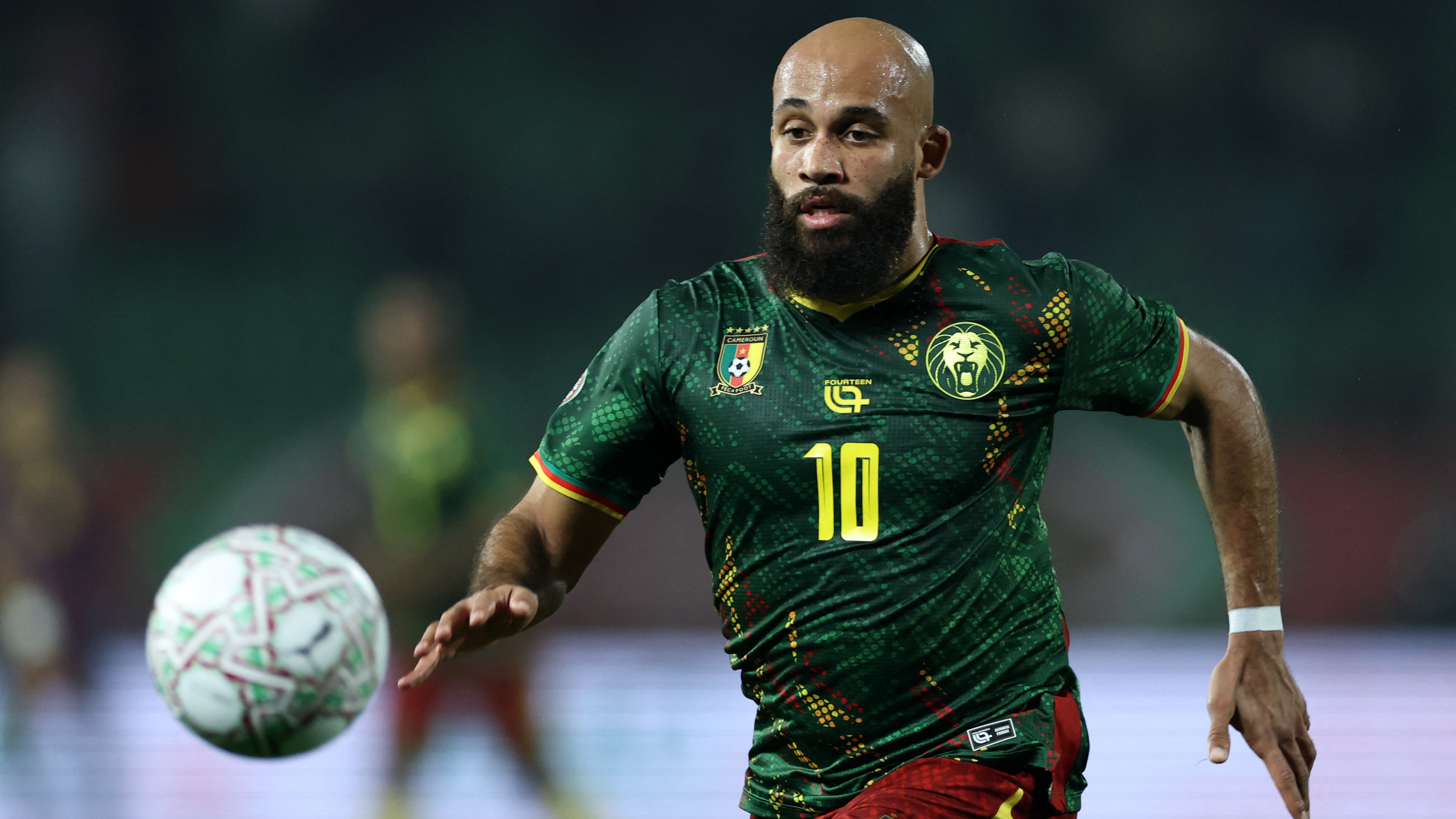 Cameroon's midfielder #10 Bryan Mbeumo runs with the ball during the Africa Cup of Nations (CAN) Group F football match between Cameroon and Gabon at Adrar Stadium in Agadir on December 24, 2025.