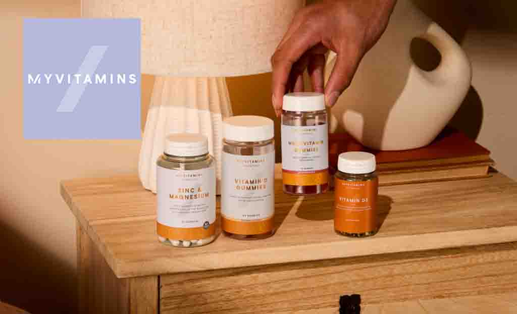 My Vitamins logo placed over four types of vitamins on a bedside table 
