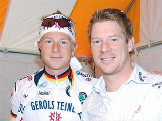 Gerolsteiner's Fabian Wegmann with a Japanese headband, smiling with his brother Christian