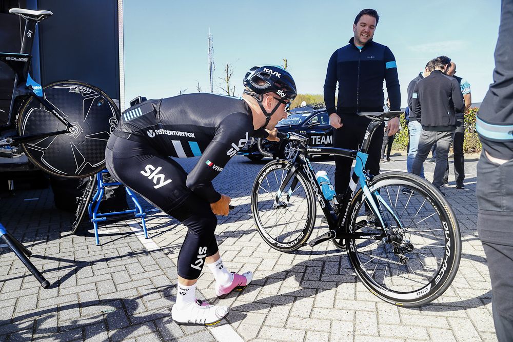 Elia Viviani (Team Sky) inspects his bike.