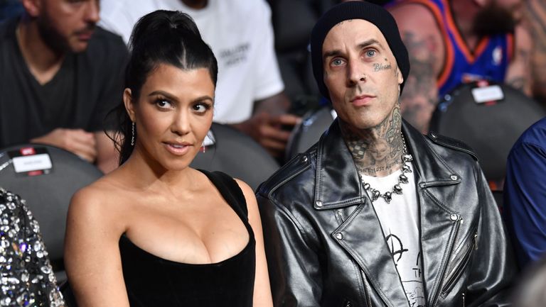las vegas, nevada july 10 kourtney kardashian and travis barker are seen in attendance during the ufc 264 event at t mobile arena on july 10, 2021 in las vegas, nevada photo by jeff bottarizuffa llc