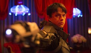 Valerian and the City of a Thousand Planets Dane DeHaan taking aim
