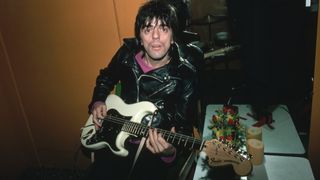 Frank Infante, then of Blondie, backstage in 1980 holding a Fender Stratocaster