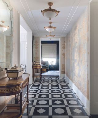 Long hallway with patterned floor and walls
