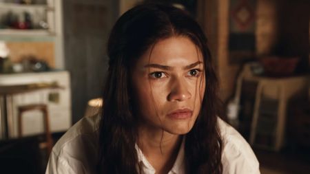Zendaya, hair pulled black and in white blouse, returns as MJ in Spider-Man: Brand New Day (2026).