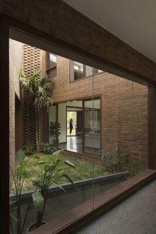 Brick House features green courtyards