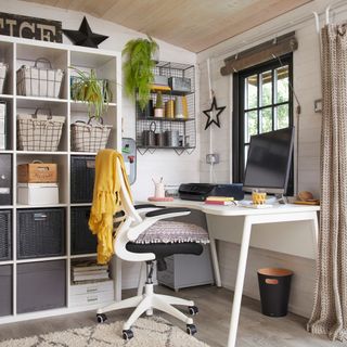 garden room with home office desk and plenty of storage