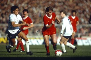 Kenny Dalglish on the ball for Liverpool against Tottenham in the 1982 Milk Cup final.