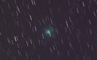 Comet C/2019 Y4 Atlas is slowly brightening in the night sky as it gets ready to swing around the sun in a couple months. Astrophotographer Mike Cuffe captured these two images of the green comet through his backyard telescope on Monday (March 23). In the first stacked image, the comet appears a bit blurry as it moves across a fixed background of stars. For the second image, the telescope was fixed on the comet, so the background stars appear as short trails behind a sharper image of the comet. Comet C/2019 Y4 Atlas is expected to make its closest approach to Earth on May 23, about one week before it reaches perihelion, or its closest point to the sun. It will brighten dramatically during this approach, and it may become visible to the naked eye in late April or May.