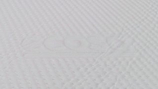 Ecosa Pure mattress logo on fabric close up