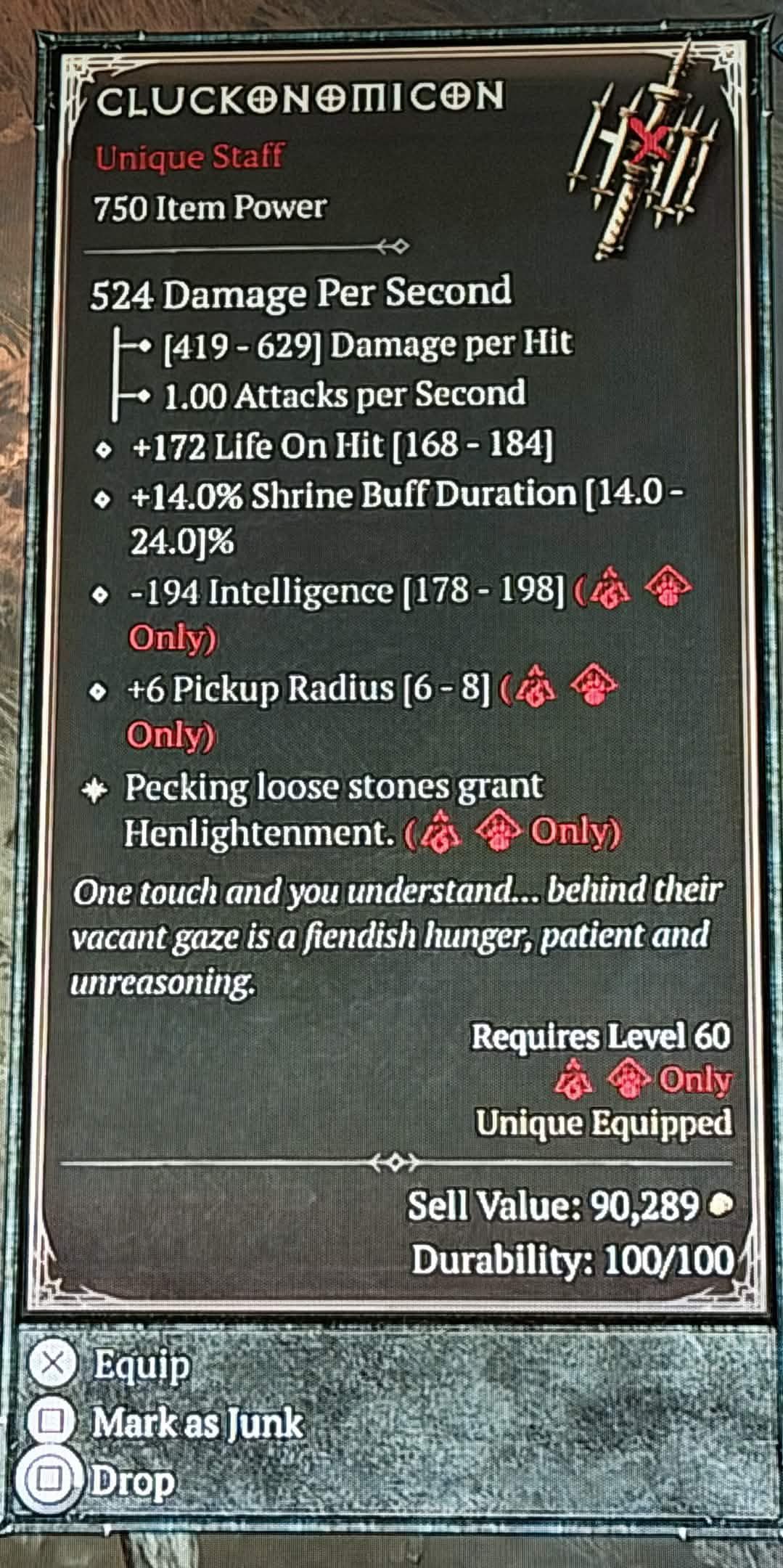 A screenshot of an April Fool's Day item in Diablo 4. A Cluckonomicon staff that gives you increased pickup radius and a bonus that grants Henlightenment when you lift up loose stones.