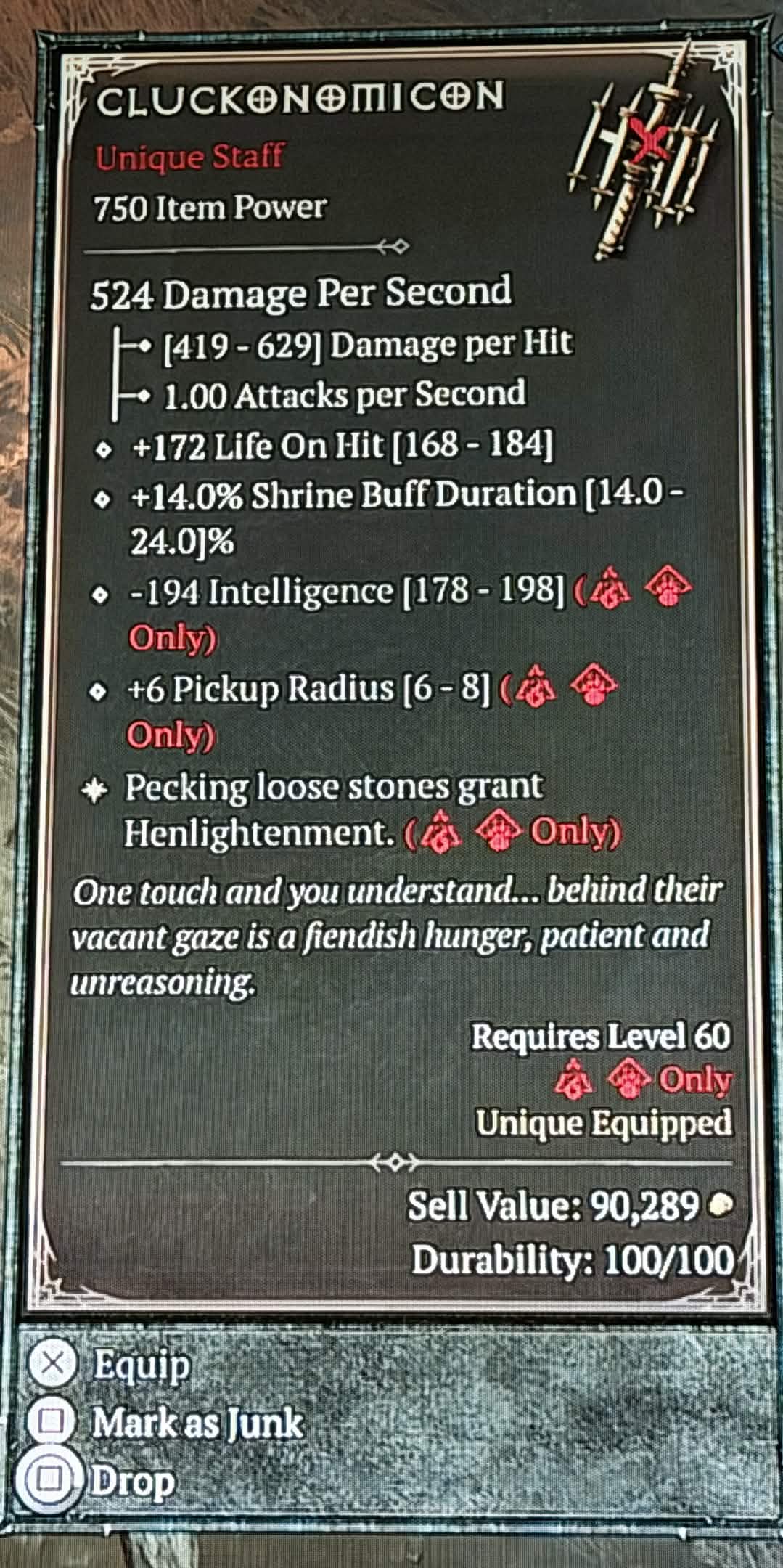 A screenshot of an April Fool's Day item in Diablo 4. A Cluckonomicon staff that gives you increased pickup radius and a bonus that grants Henlightenment when you lift up loose stones.