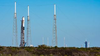 The SpaceX Falcon 9 in this photo taken on Jan. 30, 2022 picture is set to launch the Cosmo-SkyMed Second Generation FM2 satellite. In the background, at right, is the SpaceX's Starlink launch atop a second SpaceX Falcon 9 from NASA's Kennedy Space Center. The photo was taken from a site near the Cosmo-SkyMed satellite's launch site at Space Launch Complex 40 of Cape Canaveral Space Force Station in Florida.
