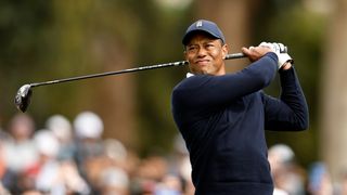 Tiger Woods hits a drive
