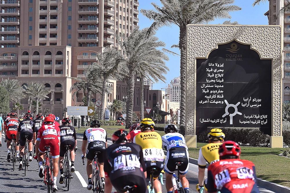 The peloton heads toward Doha City during stage 2 in Qatar