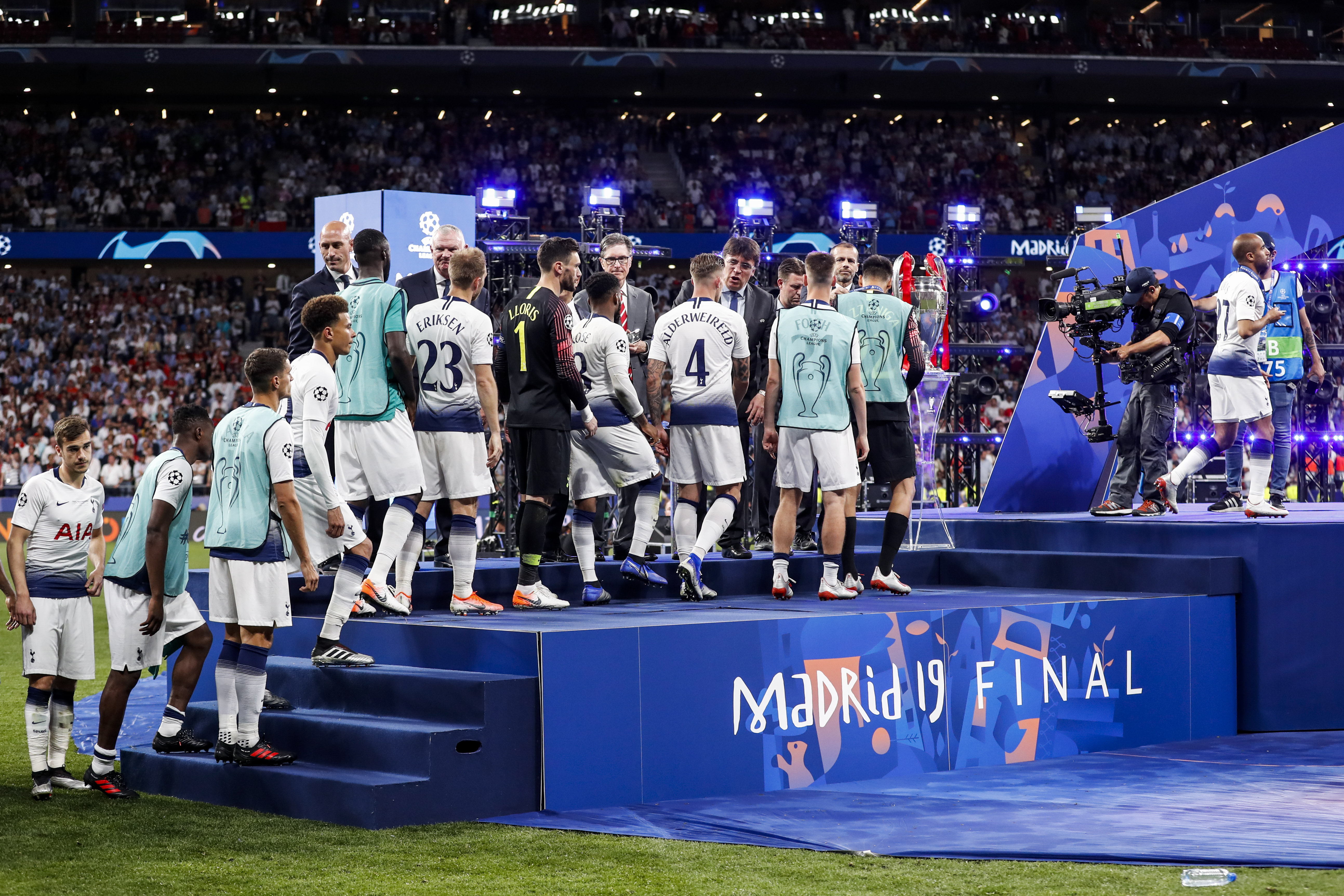 Tottenham players receive their runners-up medals after Champions League final defeat to Liverpool in June 2019.