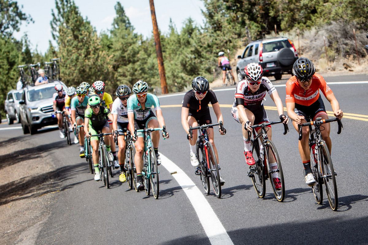 Kirsti Lay (Rally) leads the field to chase down the break