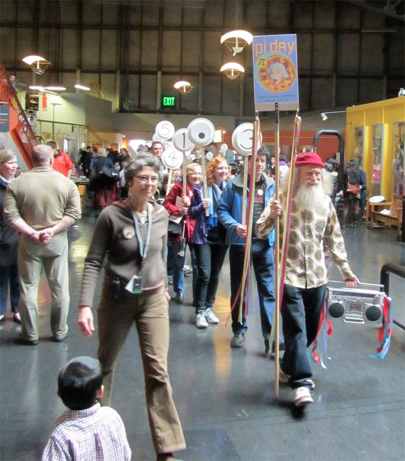 Pi Day founder Larry Shaw leads marchers — each of whom represents a digit of pi — through San Francisco&#039;s Exploratorium museum on March 14, 2012.