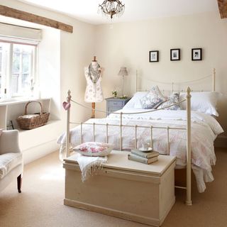 bedroom with double bed and cushions